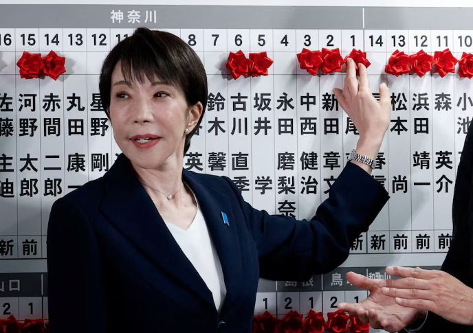 Japan PM Takaichi Vows to Cut Food Tax After Lands